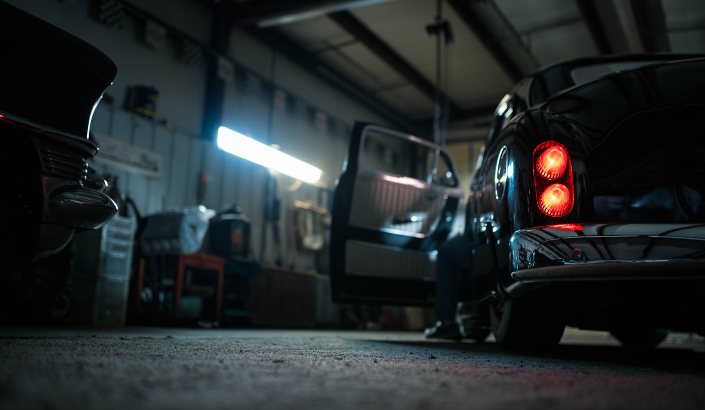 Technician carrying out careful automotive repair work